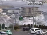 Footage of the tsunami striking Kamaishi shot from a roof.